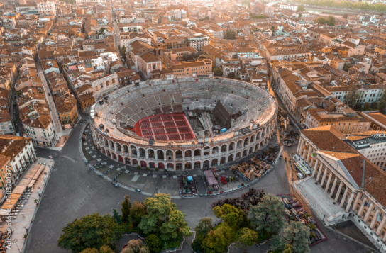 Aerial drone shot view of sunrise on ancient roman amphitheatre Verona Arena (Arena di Verona) in Verona, Italy